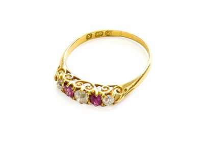 Lot 48 - An 18 Carat Gold Ruby and Diamond Five Stone...