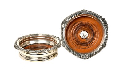 Lot 2132 - A Pair of George IV Provincial Silver Wine-Coasters