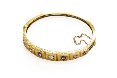 Lot 2 - A Sapphire and Diamond Hinged Bangle, stamped...