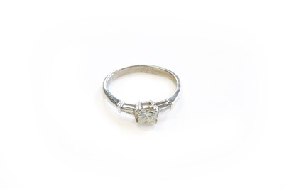 Lot 98 - A Diamond Solitaire Ring, the princess cut...
