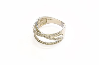 Lot 163 - An 18 Carat White Gold Diamond Crossover Ring,...