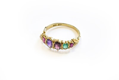 Lot 90 - An 18 Carat Gold 'REGARD' Ring, the graduated...