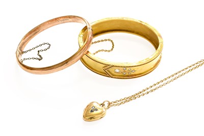 Lot 35 - A 9 Carat Gold Hinged Bangle, inner...