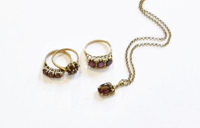 Lot 139 - Two 9 Carat Gold Garnet Rings, varying designs...