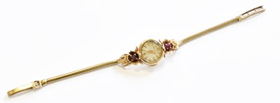 Lot 146 - A Lady's 9 Carat Gold Back Winding Synthetic...