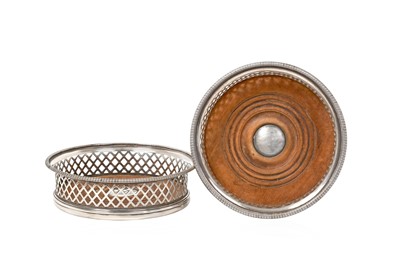 Lot 2112 - A Pair of George III Silver Wine-Coasters