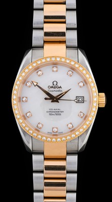 Lot 2164 - Omega: A Steel and Gold Diamond Set Automatic...