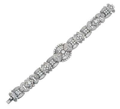 Lot 2328 - A Diamond Bracelet set throughout with round...