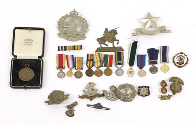 Lot 9 - A Collection of Eleven Miniature...