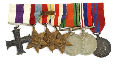 Lot 27 - A Second World War MC Group of Seven Medals,...