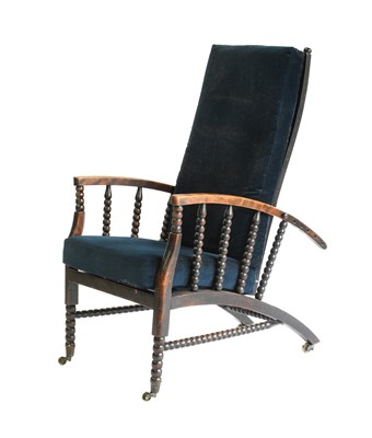 Lot 646 - An Arts & Crafts Stained Beech Reclining...