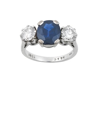 Lot 2229 - A Sapphire and Diamond Three Stone Ring the...