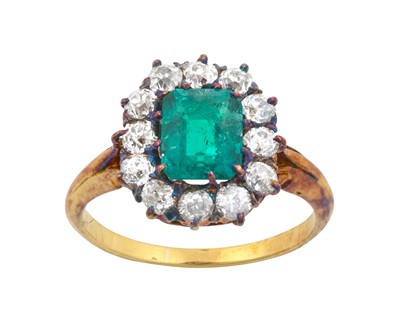 Lot 2289 - An Emerald and Diamond Cluster Ring the...