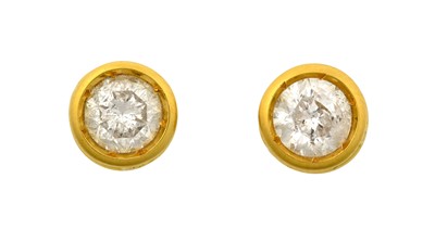 Lot 2211 - A Pair of 18 Carat Gold Diamond Solitaire...