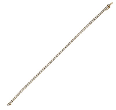 Lot 2217 - An 18 Carat Gold Diamond Line Bracelet the...