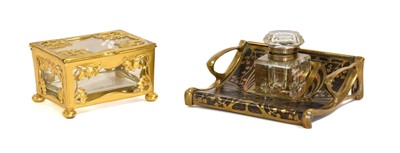 Lot 626 - A German Art Nouveau Brass and Rosewood...