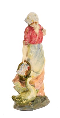 Lot 583 - A Royal Doulton Figure The Goose Girl, HN 559,...