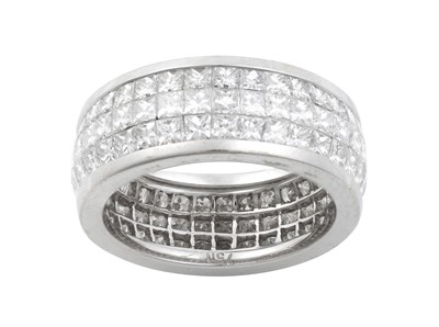 Lot 2269 - A Diamond Eternity Ring three rows of princess...