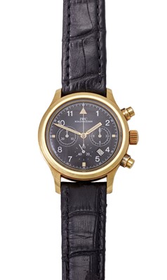 Lot 2183 - IWC: An 18 Carat Gold Calendar Chronograph...