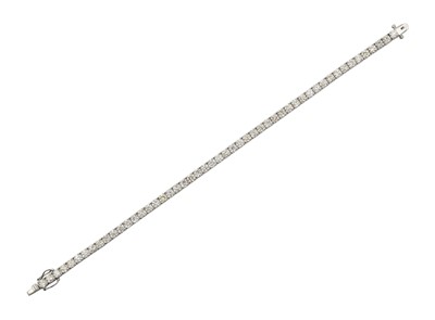 Lot 2257 - A Diamond Line Bracelet the fifty-one round...