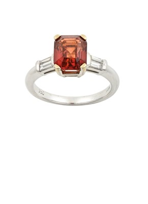 Lot 2255 - An 18 Carat White Gold Orange Sapphire and...