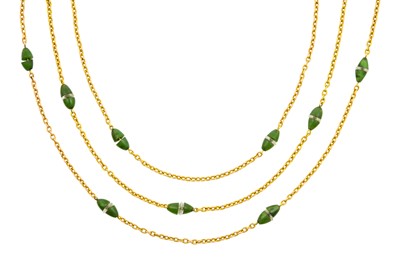 Lot 2307 - A Nephrite and Rock Crystal Necklace a yellow...
