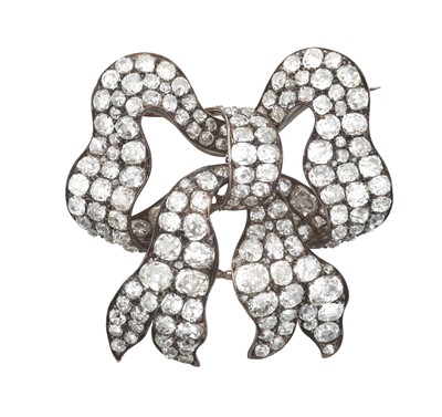Lot 2343 - A Diamond Bow Brooch, circa 1850 the stylised...