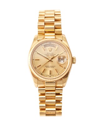 Lot 2192 - Rolex: An 18 Carat Gold Automatic Day/Date...