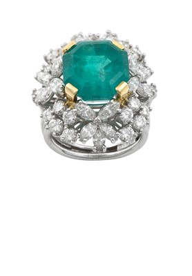 Lot 2326 - An Emerald and Diamond Cluster Ring the...
