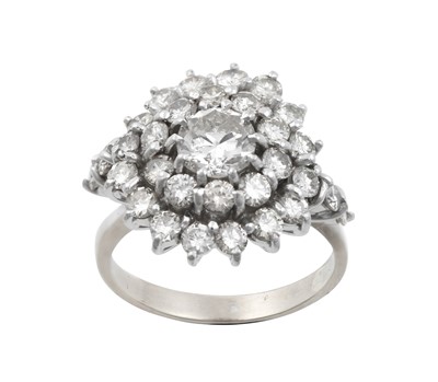 Lot 2224 - A Diamond Cluster Ring the central round...