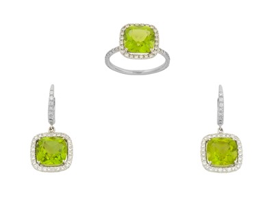 Lot 2258 - A Peridot and Diamond Cluster Ring and A Pair...