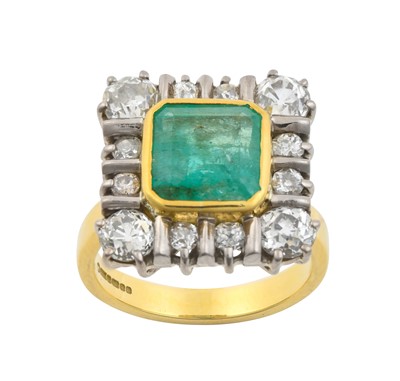 Lot 2324 - An 18 Carat Gold Emerald and Diamond Cluster...
