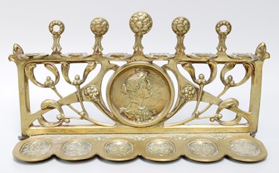 Lot 90 - An Art Nouveau Brass Pipe Stand, cast with the...