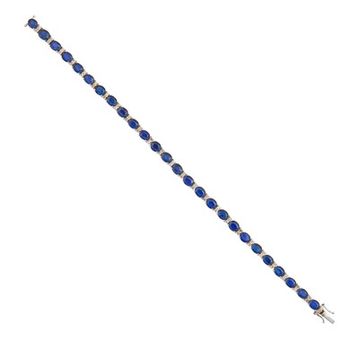 Lot 2220 - A Sapphire and Diamond Bracelet twenty-six...