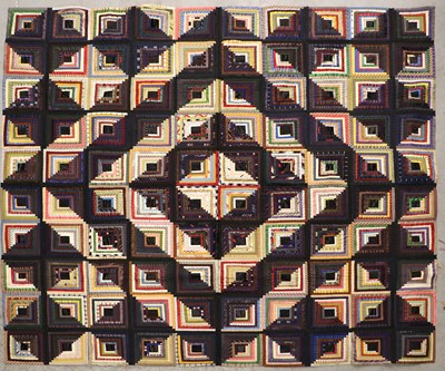 Lot 2002 - A 19th Century Silk Patchwork Cover, worked in...