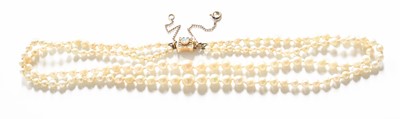 Lot 309 - A Two Row Cultured Pearl Necklace, knotted to...