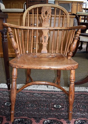 Lot 1458 - A 19th-century Elm Windsor Armchair, with...