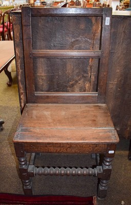 Lot 1430 - An 18th Century Provincial Oak Chair, panelled...