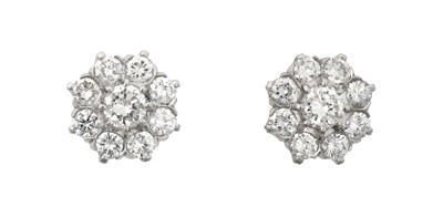 Lot 2265 - A Pair of Diamond Cluster Earrings the central...