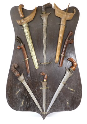 Lot 174 - A Display of Eight 19th Century Indonesian...