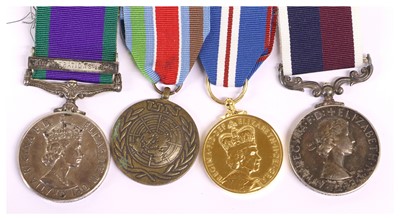 Lot 20 - An Elizabeth II RAF Long Service Group of Four...