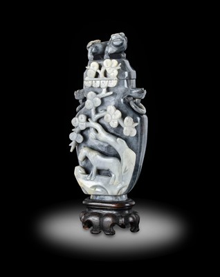 Lot 50 - ~ A Chinese Two Colour Mottled Grey Jade Vase...