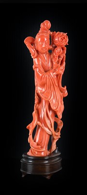 Lot 59 - ~ A Chinese Coral Figure of Guanyin, late...