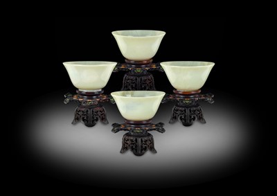 Lot 6 - ~ A Set of Four Chinese Pale Celadon Jade...