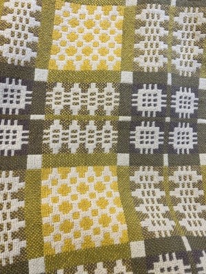 Lot 2087 - A Welsh Wool Blanket in cream, yellow and...