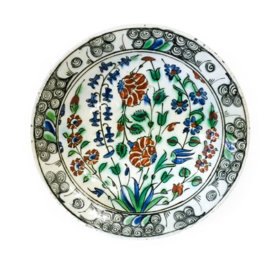 Lot 70 - An Iznik Faience Dish, late 16th/early 17th...