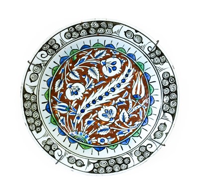 Lot 71 - An Iznik Faience Dish, late 16th/early 17th...