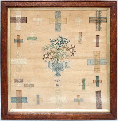 Lot 2058 - A 19th Century Darning Sampler, depicting a...