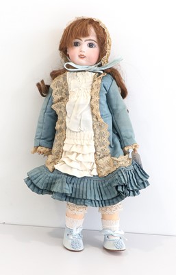 Lot 2090 - Small Bisque Socket Head Doll with fixed blue...