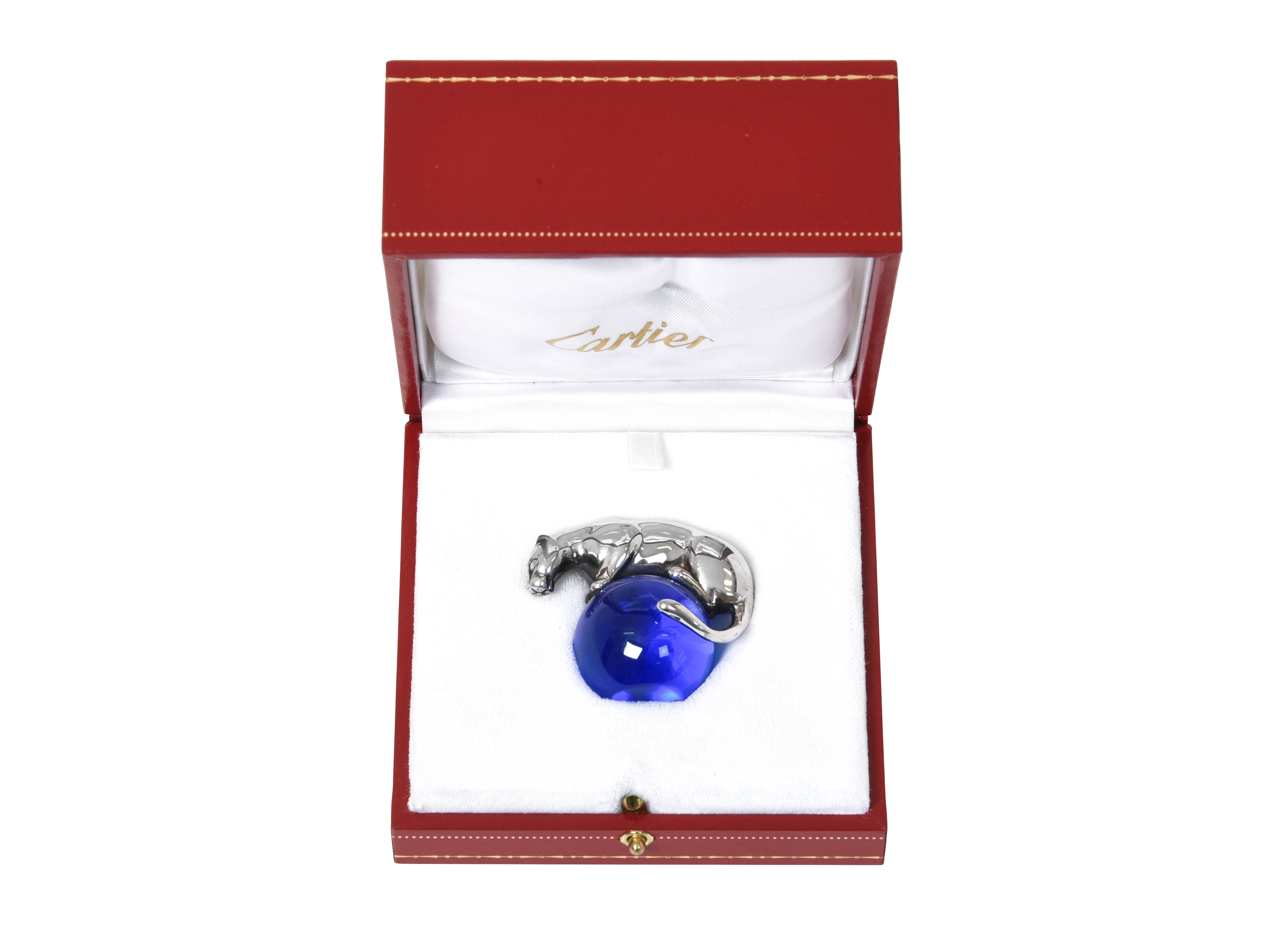 Lot 2255 - A Cartier Silver and Blue Glass Paperweight,